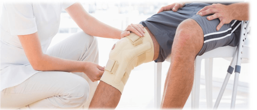 Clinician fitting a knee brace